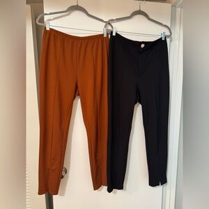 Two pairs of women’s elegant slacks/pants, one Rust Orange and one Black